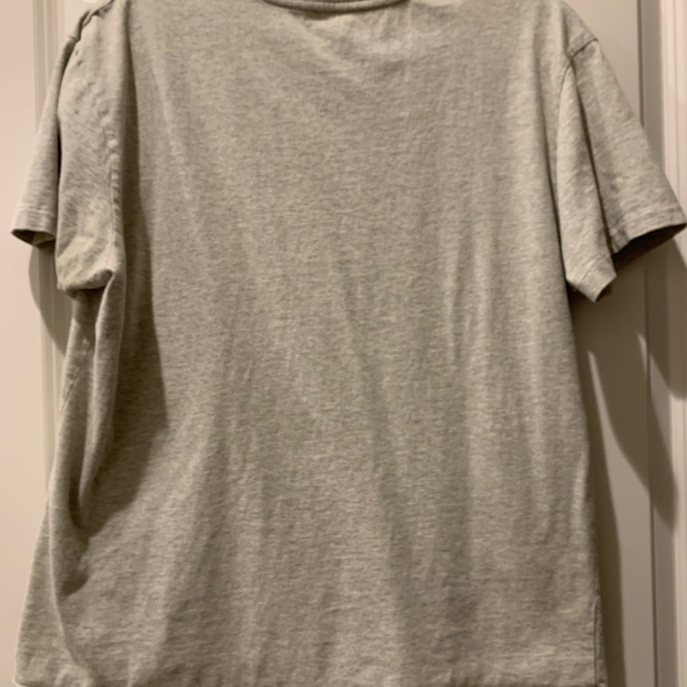 Polo short sleeve men’s size Large in Heather gray. This shirt is pre-owned.